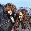 Lea Thompson and Jennifer Grey on promotional Red Dawn photo.